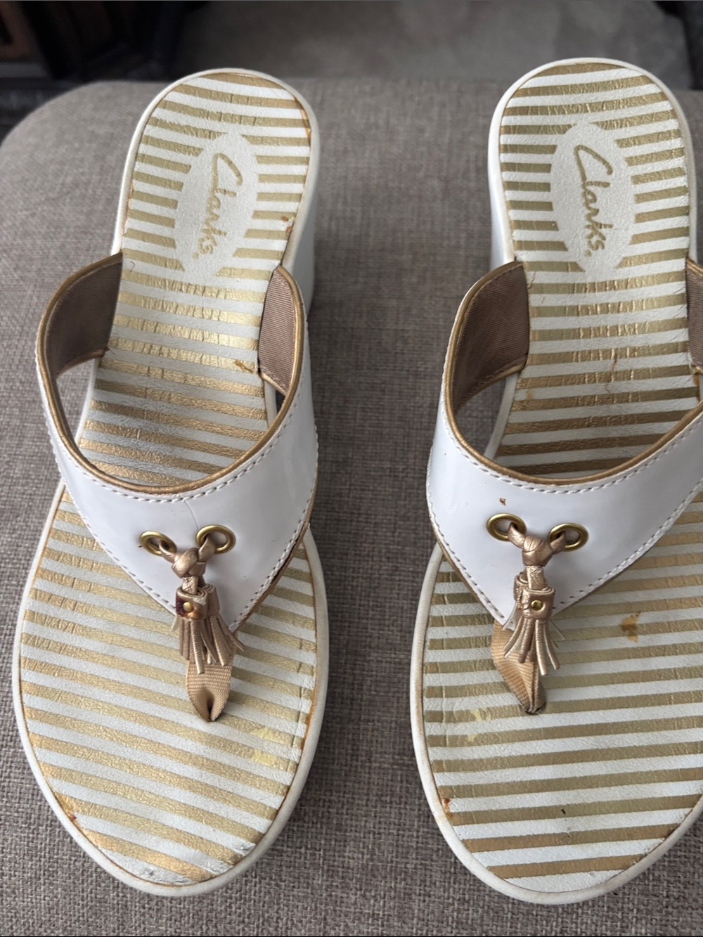 Clarks Women’s White and Gold Tassel Wedge Sandals